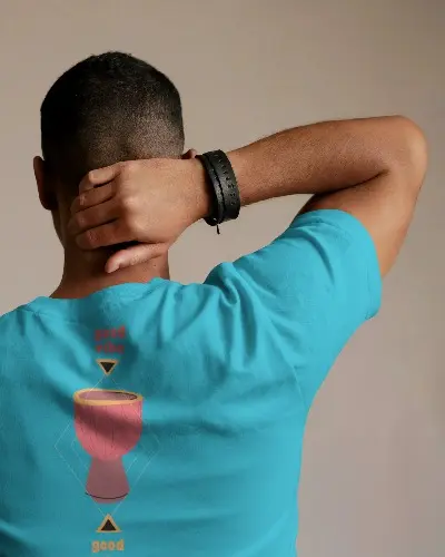 studio-backview-tshirt-mockup-man-in-white-tee-hand-on-head-neutral-backdrop-clean-lighting-1829.webp